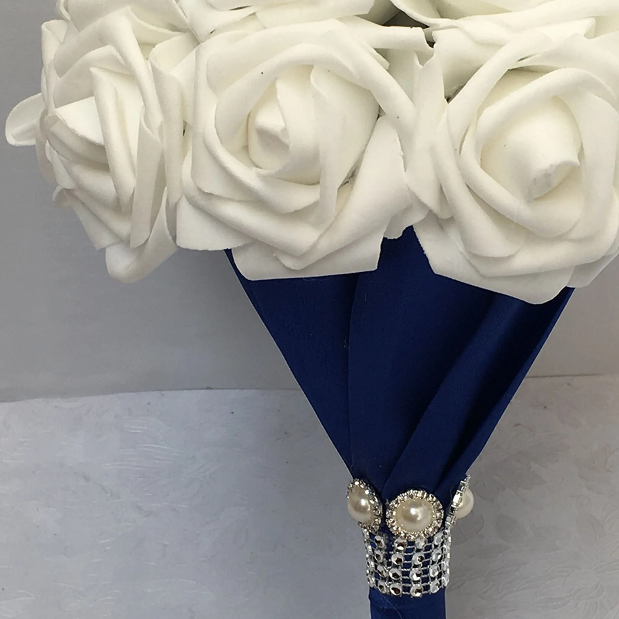 White Rose Bridal Bouquet with Royal Blue Ribbon